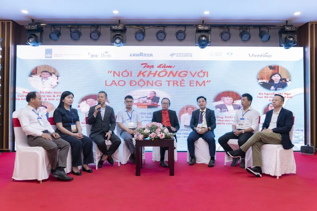 Participants discuss child labour prevention at the programme's review event.